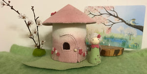 Spring felt house with leaf base